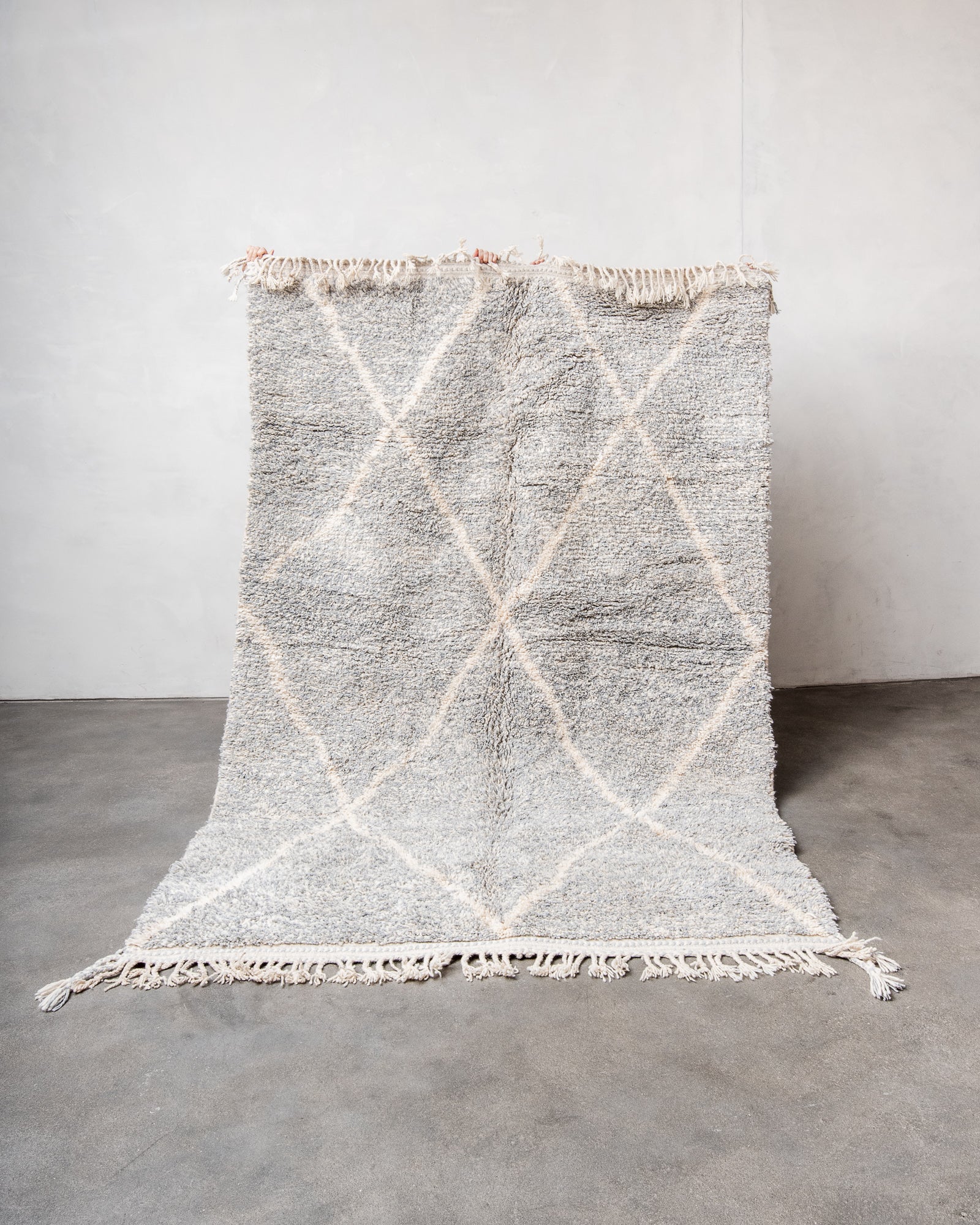 Modern, designer, handcrafted Berber rug from Morocco. Beniourain carpet with beautiful colours and patterns and fluffy wool texture.